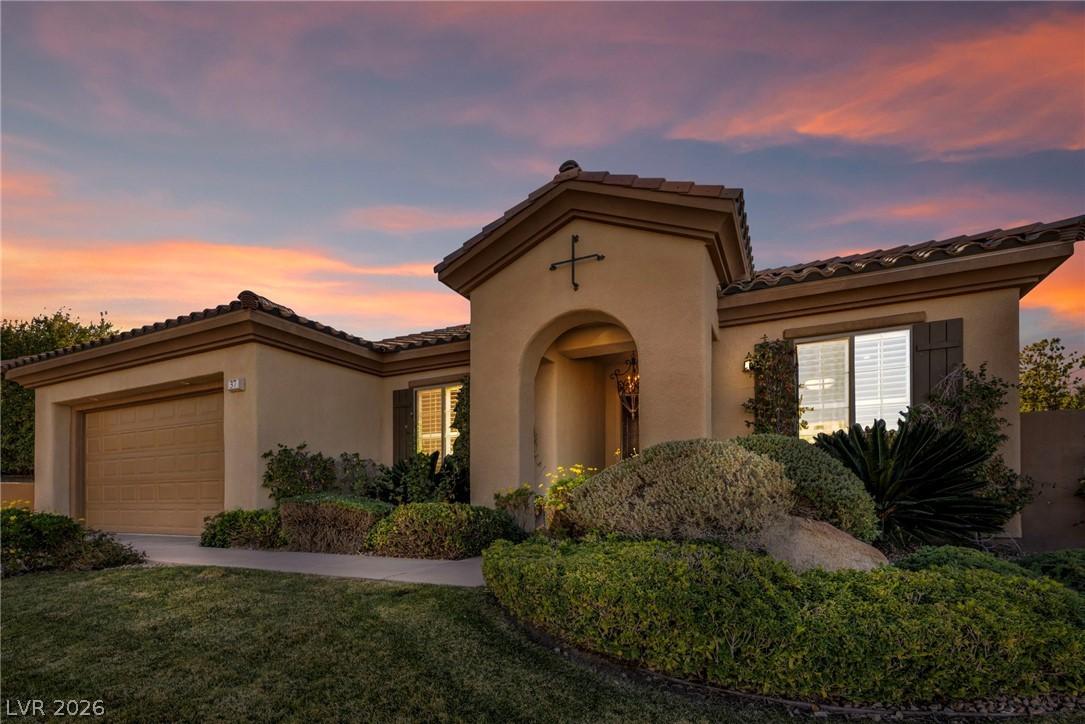 Image 2: Mediterranean / spanish-style house featuring a ti