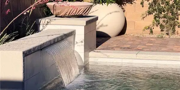 Image 3: A tranquil cascade spills into a sparkling pool, b
