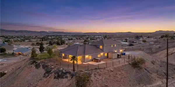 Image 2: Perched on a desert hillside, this home offers tra