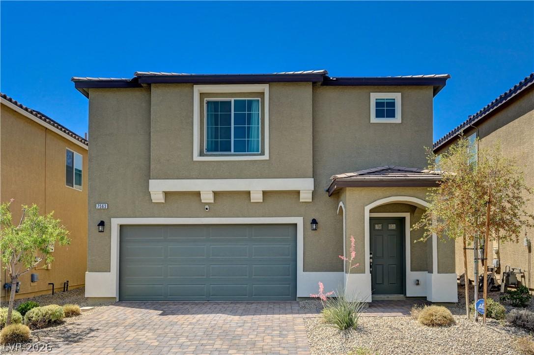 Image 1: This charming home features a welcoming entrance a