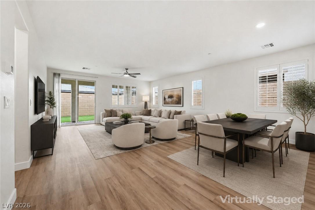 Image 2: Family Room and Dining Area - Virtually Staged