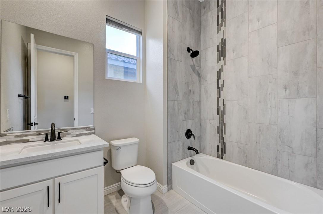 Image 4: A well-appointed bathroom with contemporary fixtur