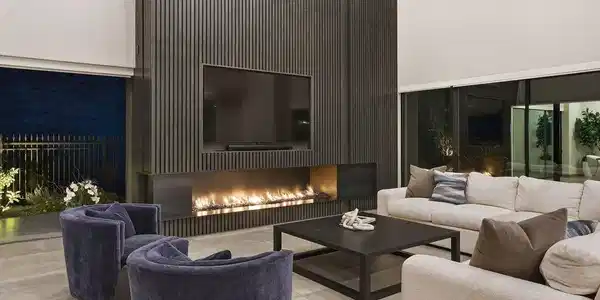 Image 4: Family Room with Maple-Clad Wall & Fire Feature