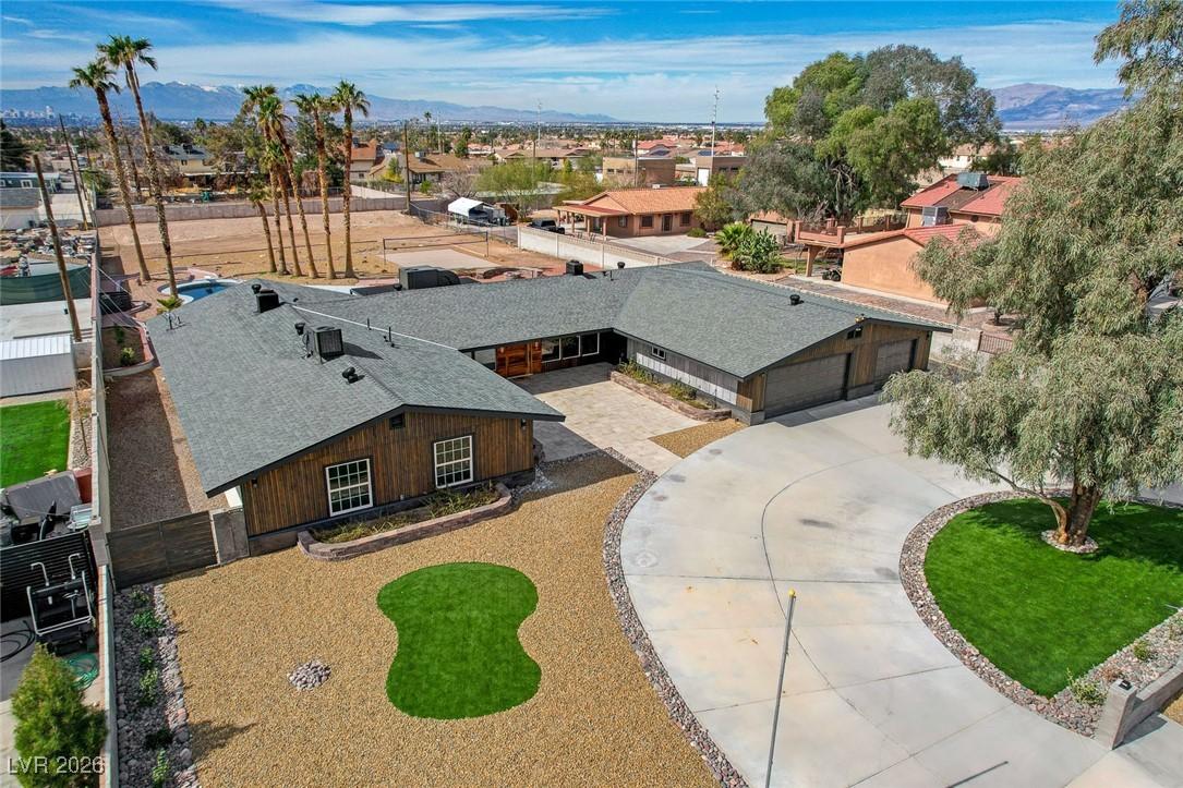 Image 1: aerial view front of house