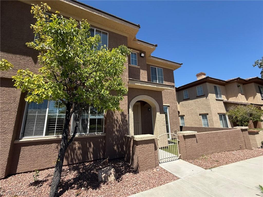Image 3: This charming home offers inviting curb appeal wit
