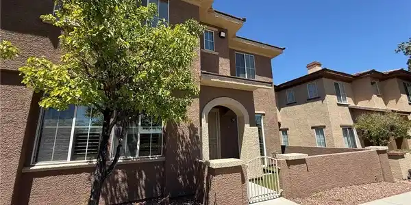 Image 3: This charming home offers inviting curb appeal wit