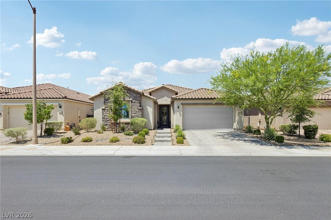 Image 2: A desert-friendly landscape surrounds this charmin