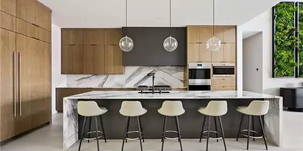 Image 3: A contemporary kitchen features an elegant marble