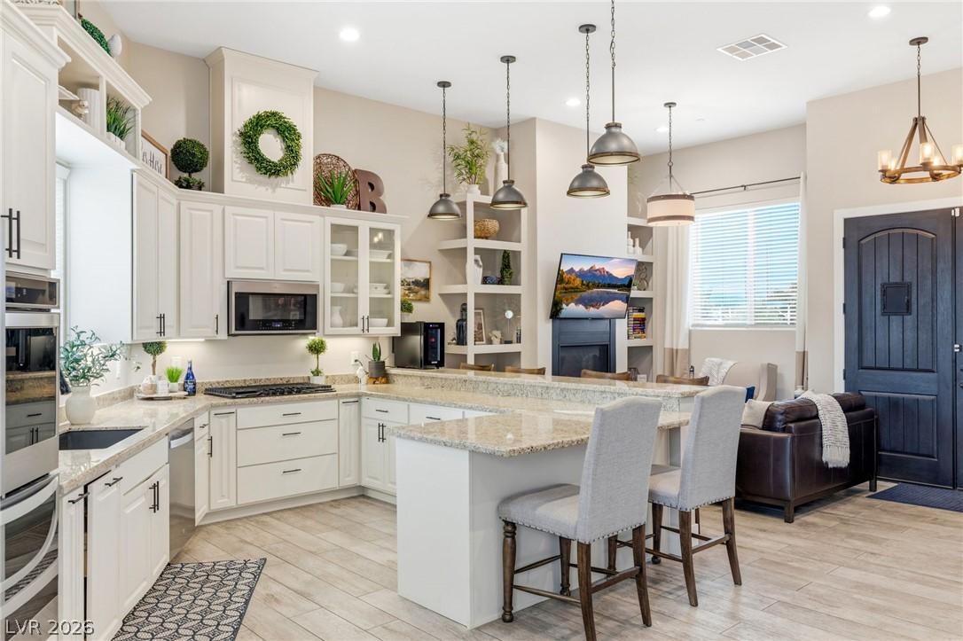 Image 4: House#1 kitchen which includes all stainless steel