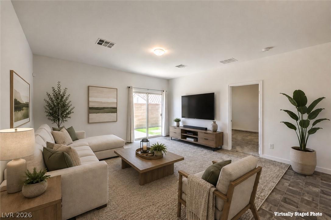 Image 4: A well-lit living area offers comfort and connecti