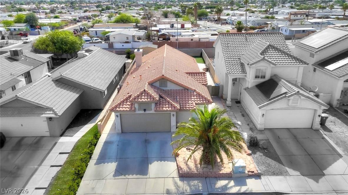 Image 2: An aerial perspective showcases a charming residen