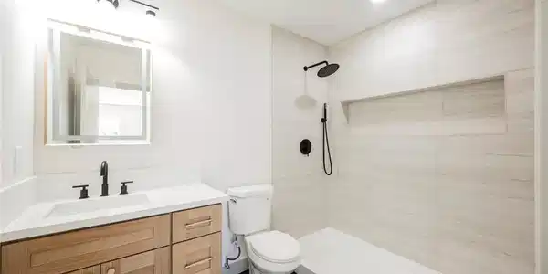 Image 2: Clean lines and modern tilework define this beauti