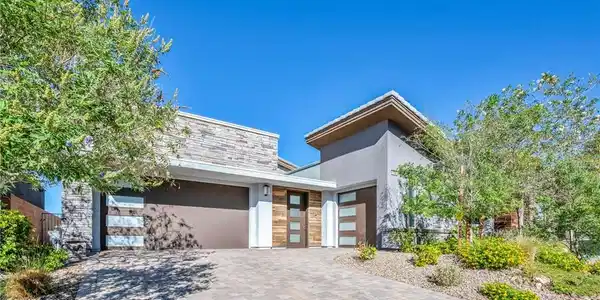 Image 3: Contemporary architectural lines and stone accents