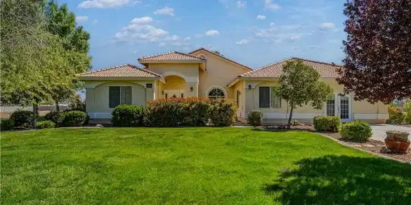 Image 2: Mediterranean / spanish home featuring a front yar