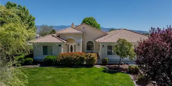 Image 4: Mediterranean / spanish house with a front yard, a