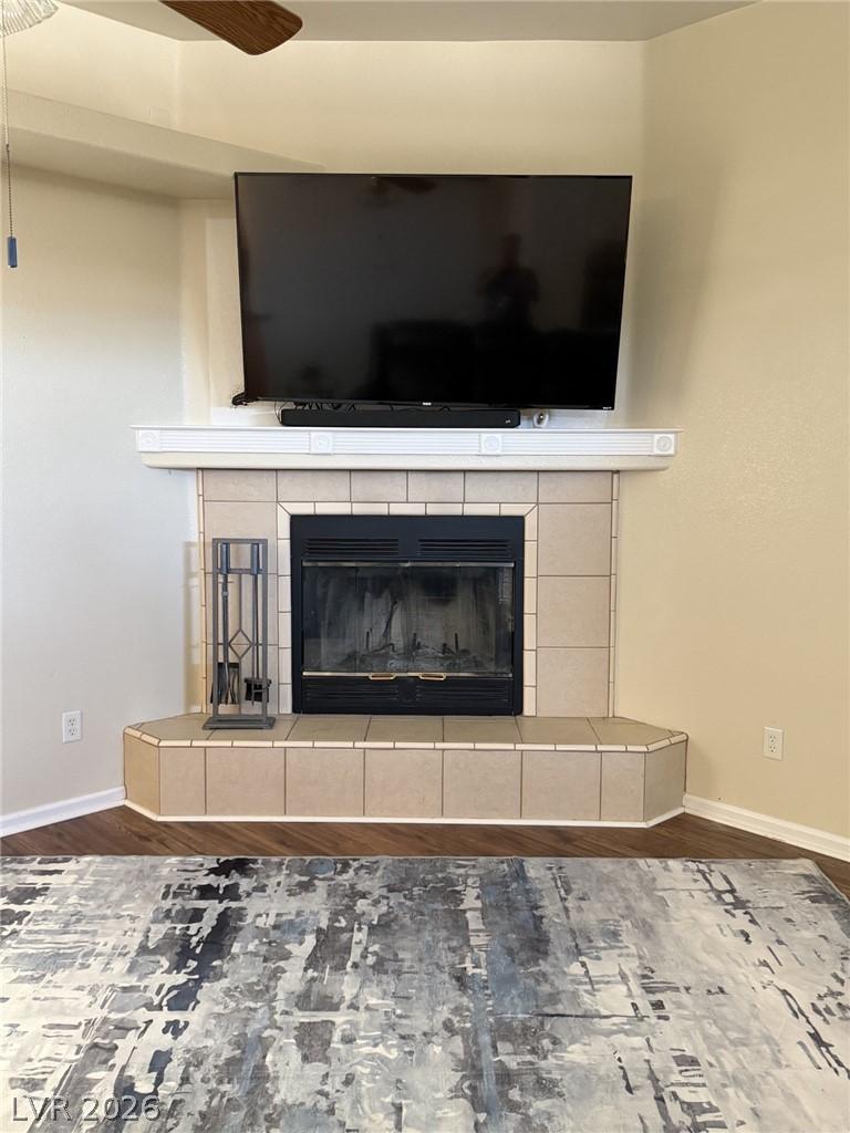 Image 4: This living room corner showcases a cozy fireplace