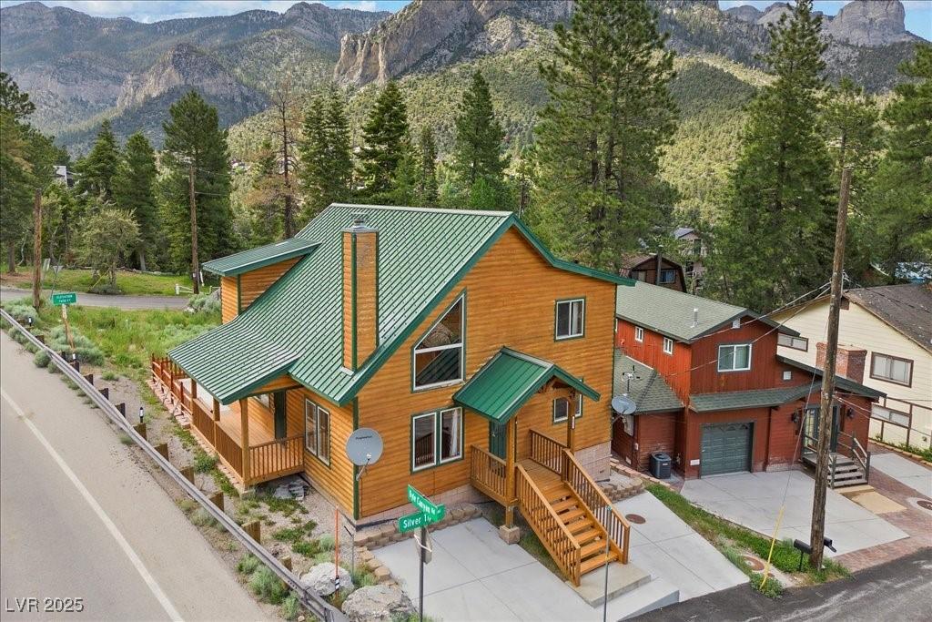 Image 2: Featuring four bedrooms + two bathrooms, soaring