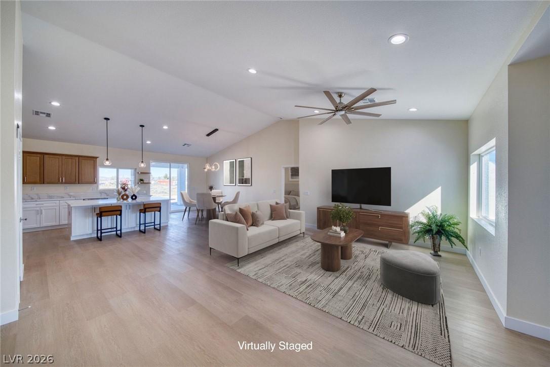 Image 2: Great room  vaulted ceiling virtually staged.