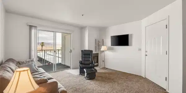 Image 4: Step into a sun-filled living space featuring carp