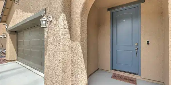 Image 4: An inviting entry showcases a recessed light and a