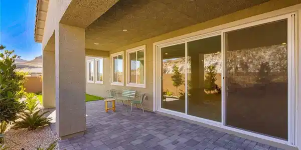 Image 3: A generously proportioned covered patio with paver