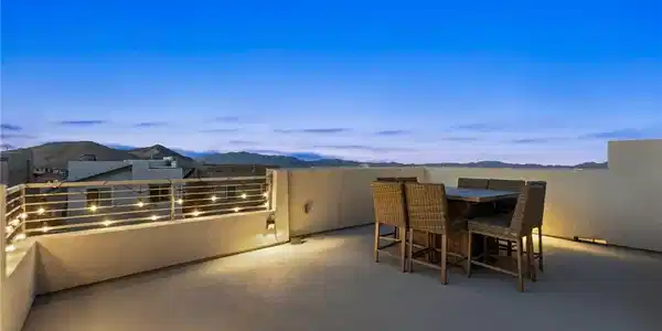 Image 4: Panoramic mountain vistas frame this concrete roof