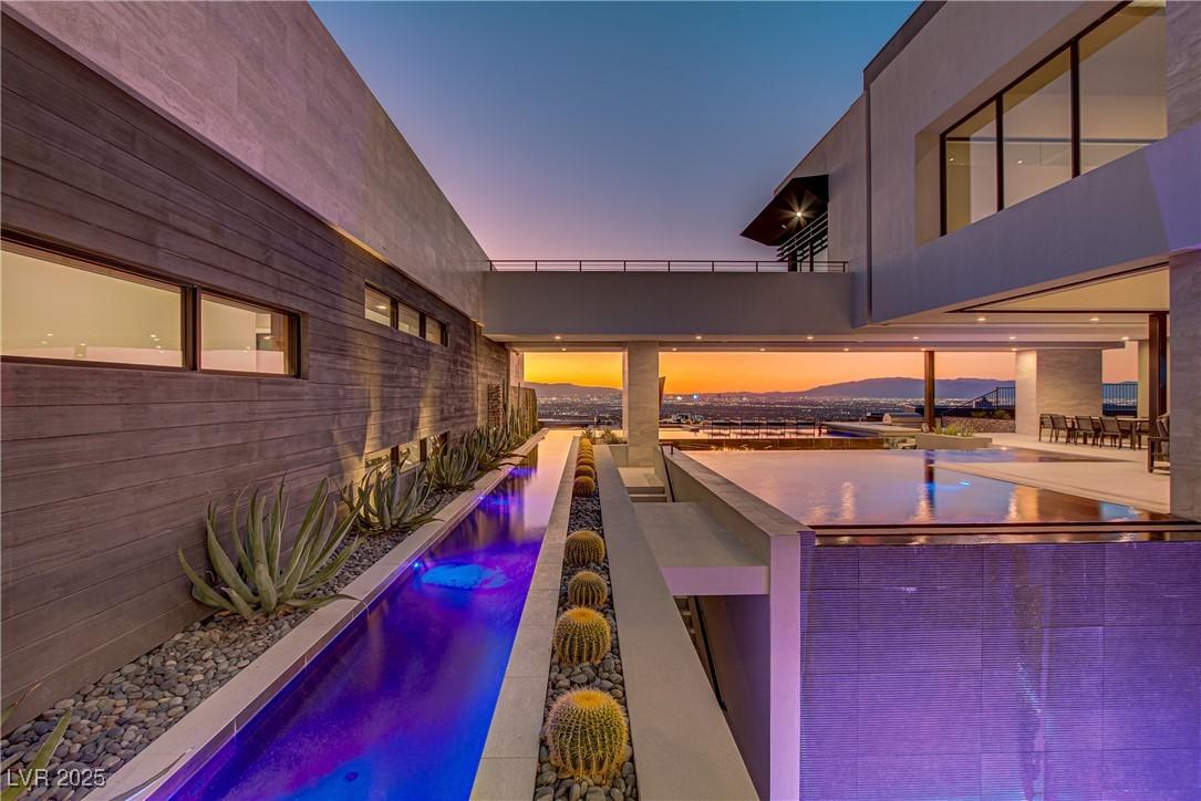 Image 4: View of swimming pool featuring a patio area