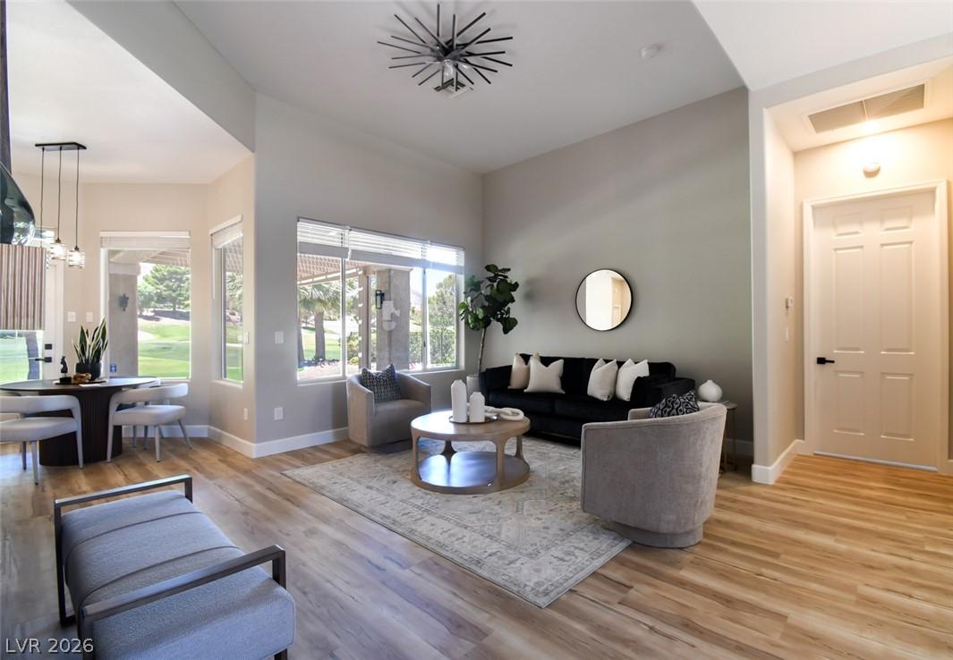 Image 3: An inviting open-concept living area with luxury v