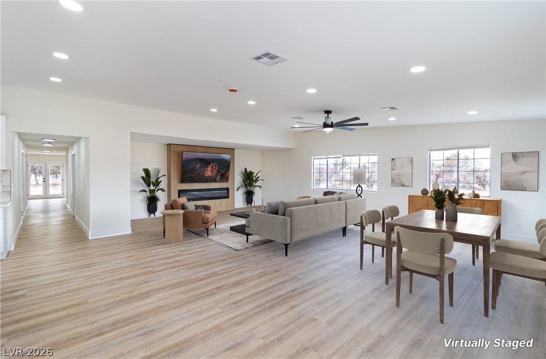 Image 2: Dining space with baseboards, recessed lighting, v