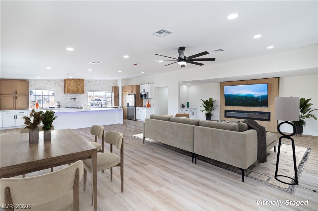 Image 3: Living area featuring visible vents, recessed ligh
