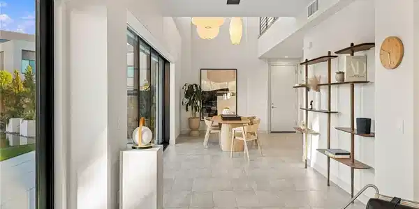 Image 4: Soaring ceilings and clean tiled floors define thi