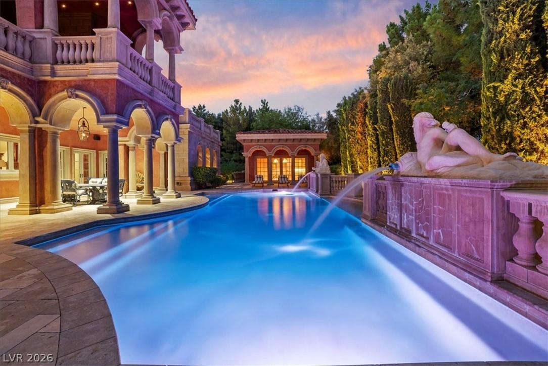 Image 4: Swimming pool with an exterior structure, an outbu