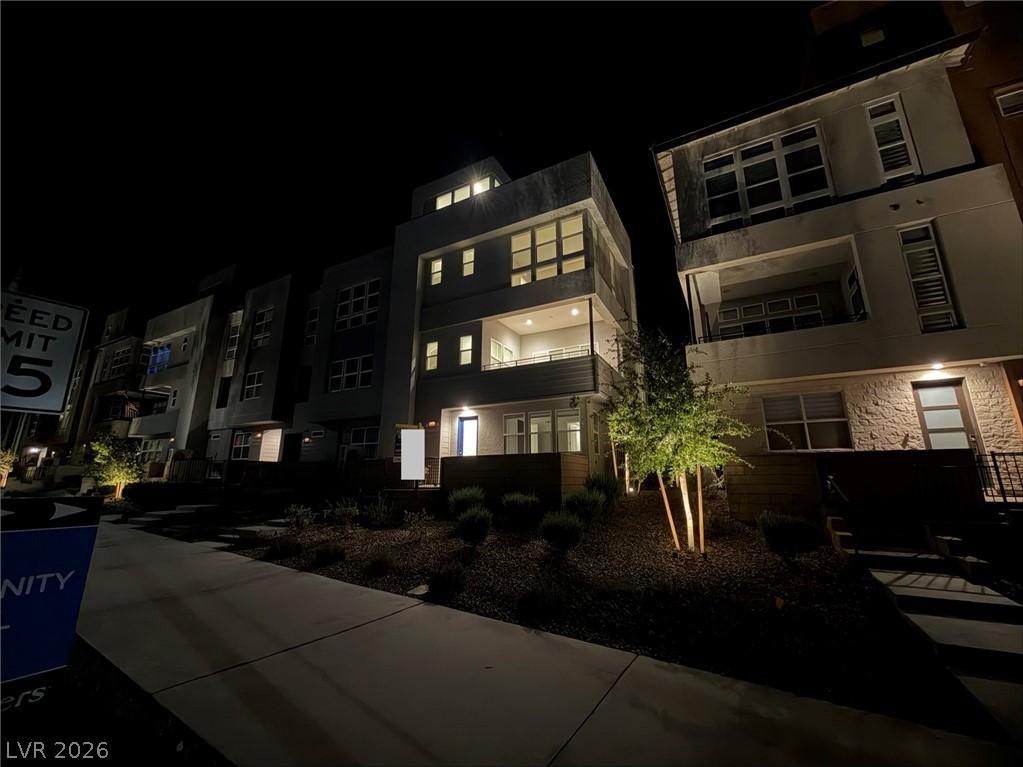 Image 4: Front of home at night