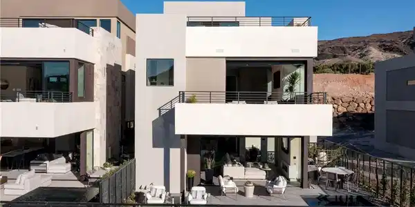 Image 2: A striking modern facade integrates multiple balco
