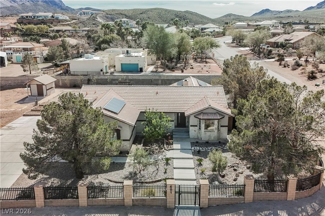 Image 2: A desert-landscaped yard with an inviting walkway
