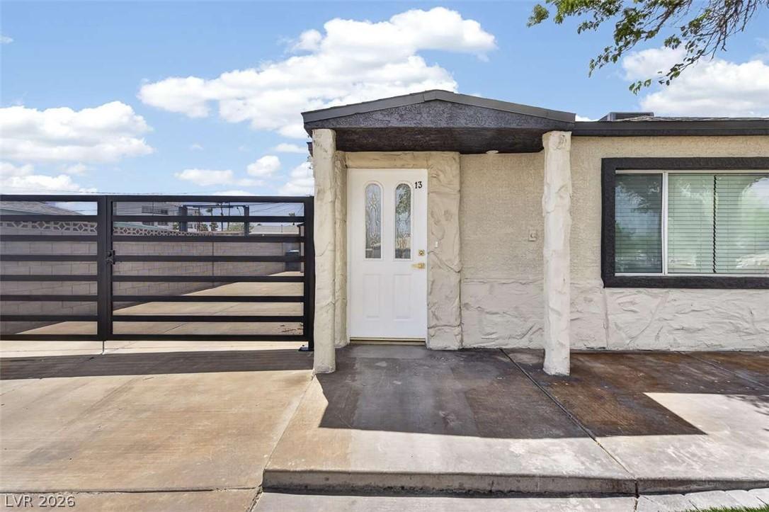 Image 4: Secure entry to this appealing home is provided by