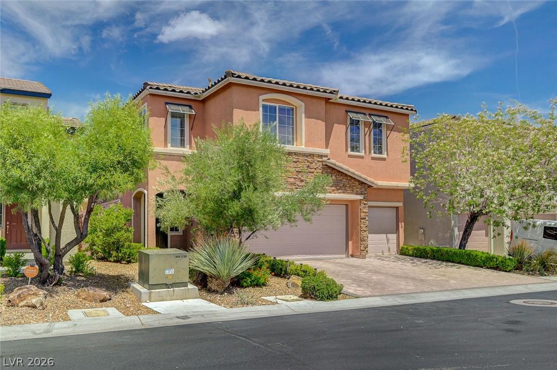 Image 2: This residence showcases a well-maintained exterio