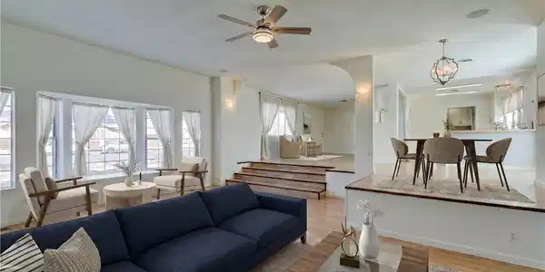 Image 3: Sun-filled living space with an open-concept layou