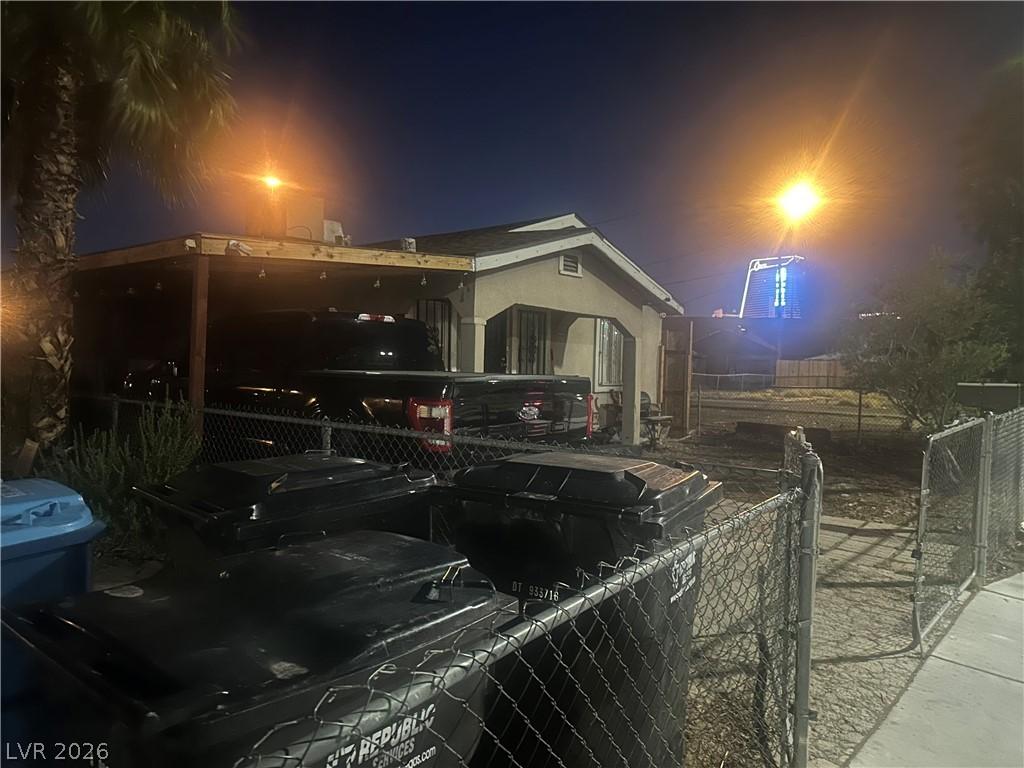 Image 2: Securely fenced yard space for ample parking and s