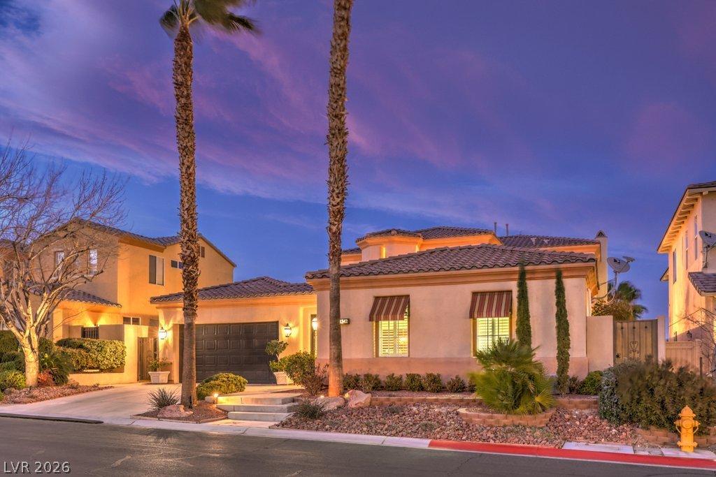 Image 3: Illuminated exterior showcases elegant architectur