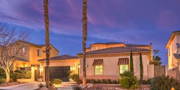 Image 3: Illuminated exterior showcases elegant architectur