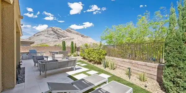 Image 3: An inviting outdoor patio with lounge seating offe