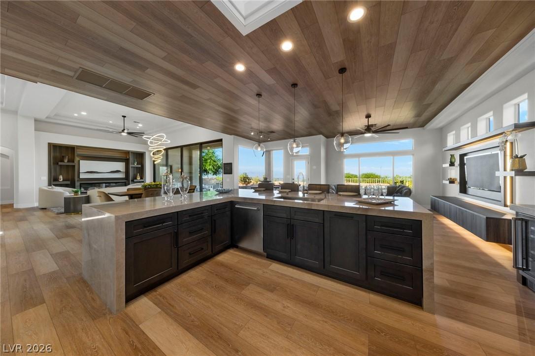 Image 3: Gourmet Kitchen with Site Lines Throughout the Hom