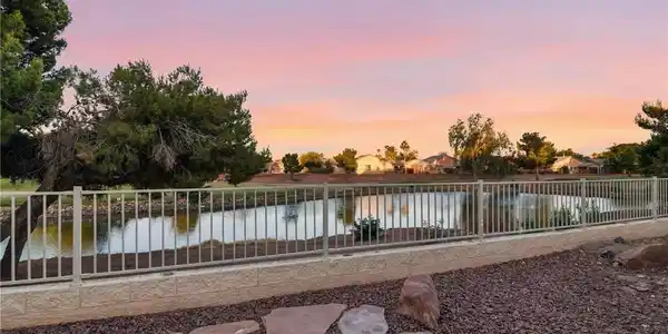 Image 2: Serene water views extend past the property bounda