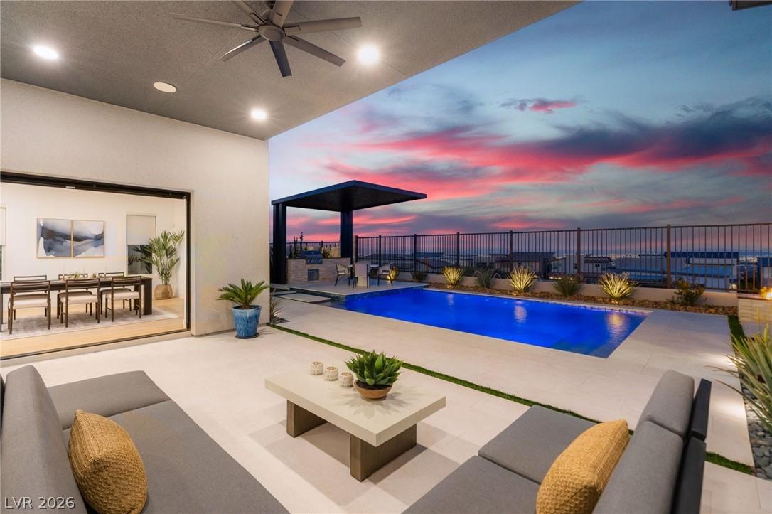 Image 3: An inviting outdoor living area features a sparkli