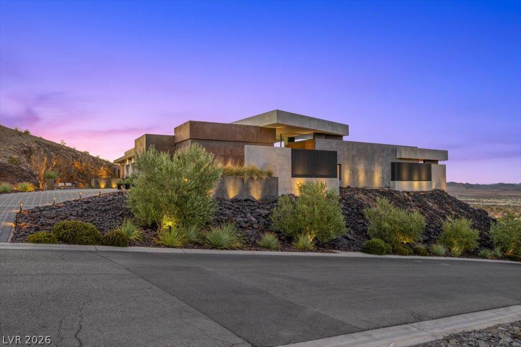 Image 2: A modern architectural marvel nestled into the hil