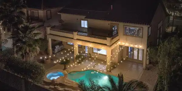Image 3: Resort-style backyard &mdash; heated pool, spa, water sl