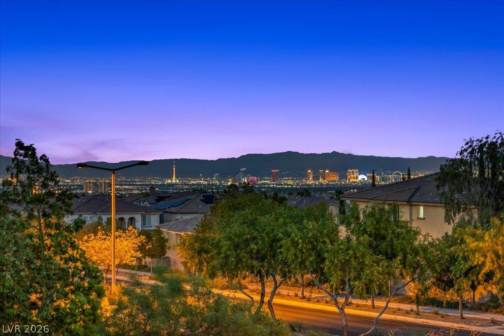 Image 3: View from primary Balcony City lights twinkle beyo