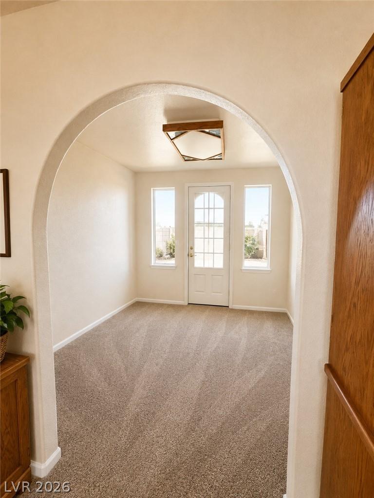 Image 3: Virtually Staged. An inviting entry space, offerin