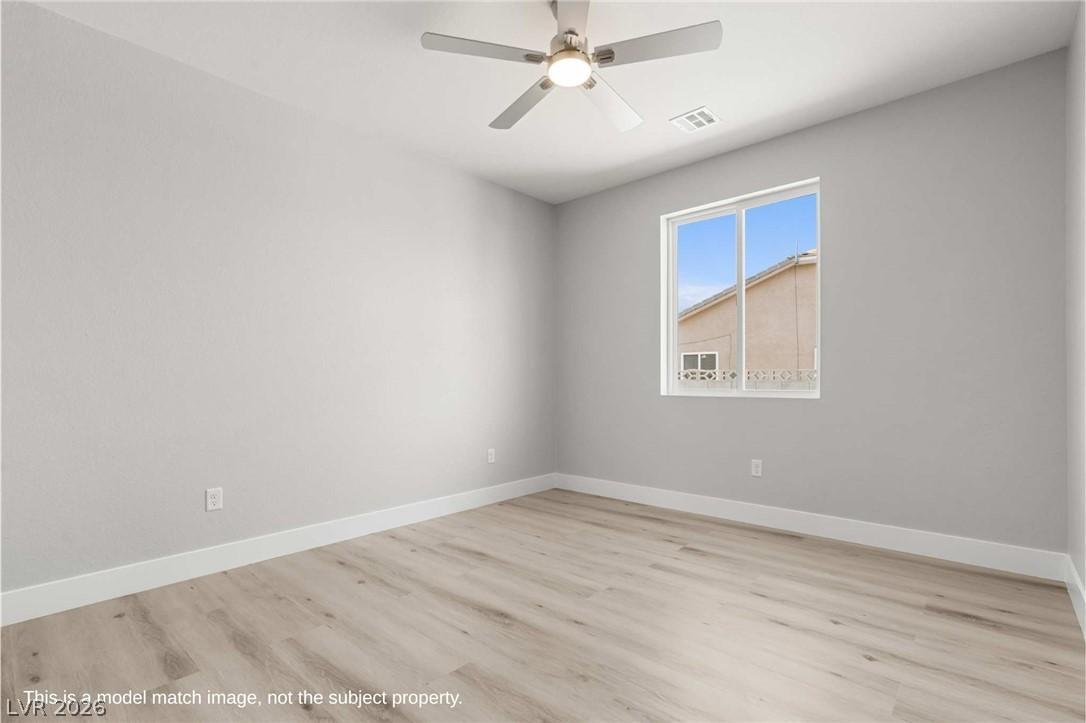 Image 4: Unfurnished room with light wood-type flooring and